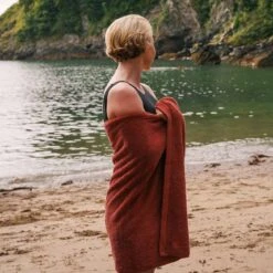 Mineral Red Organic Cotton Towels -Piglet in Bed Store Piglet in Bed Organic Cotton Towel Mineral Red Lifestyle 1 d008236a 5b9a 494a 8846 044d08ea7b06