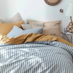 Warm Blue Seersucker Stripe Cotton Pillowcases (Pair) -Piglet in Bed Store Piglet in Bed Seersucker Stripe Bedding Warm Blue 7 5482b059 9ee1 4c1b 9e72 480e1a09e31f