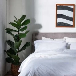 White Washed Cotton Percale Fitted Sheet -Piglet in Bed Store Piglet in Bed Washed Cotton Bedding White Lifestyle 1 f060f4a0 ec73 48ca 8c8c 38c3a338267d