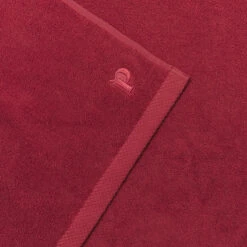 Mineral Red Organic Cotton Bath Mat -Piglet in Bed Store PigletinBed BathroomCollection OrganicCottonBathMat MineralRed 3 GreyBG 1970681a a7be 44af 8de5 e4dc7e104d43