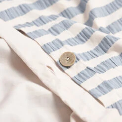 Warm Blue Seersucker Stripe Cotton Duvet Cover 10 Warm Blue Seersucker Stripe Cotton Duvet Cover -Piglet in Bed Store PigletinBed WashedCottonDuvetCover WarmBlueSeersuckerStripe 4 greyBG 2d21a9cd adaf 44b2 8223 2b106fabce44